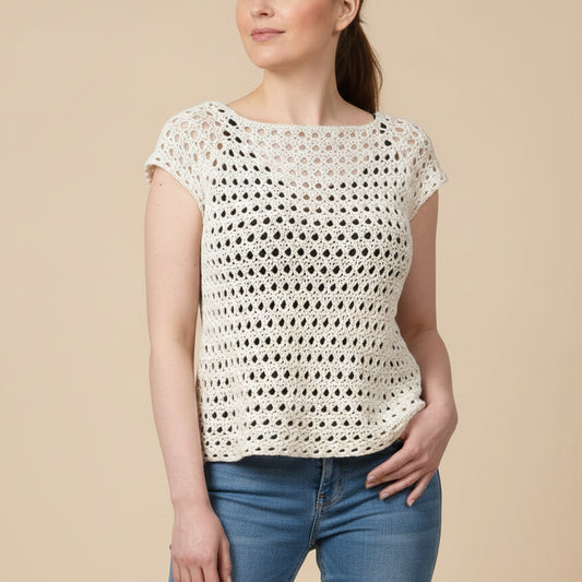 Top au point X à crocheter pour l'été. Créé par la marque Un crochet par ici.